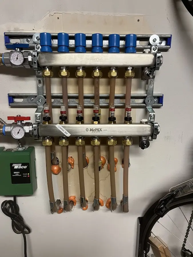 Plumber performing Gas Leak Detection at a residential property in Kirksville