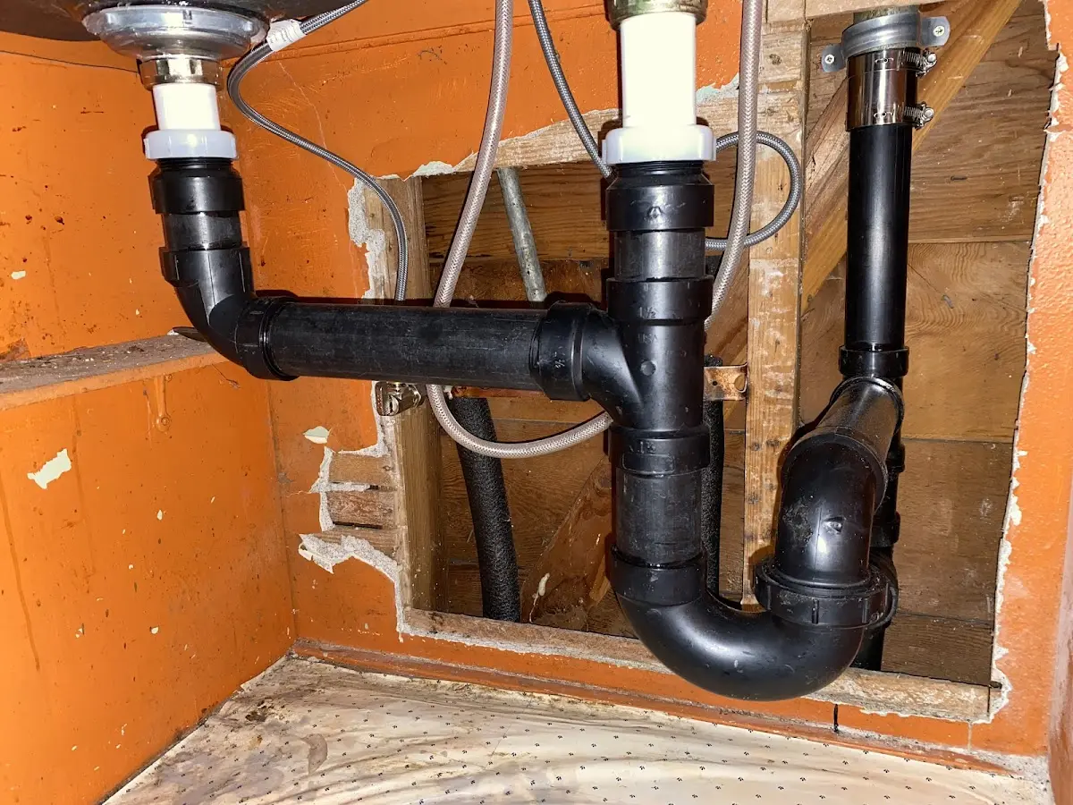 Professional Garbage Disposal Repair equipment and tools on the job in Kirksville